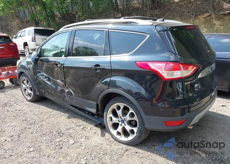 2016 Ford Escape Titanium z USA, uszkodzony, nr VIN 1FMCU9JX1GUC18335